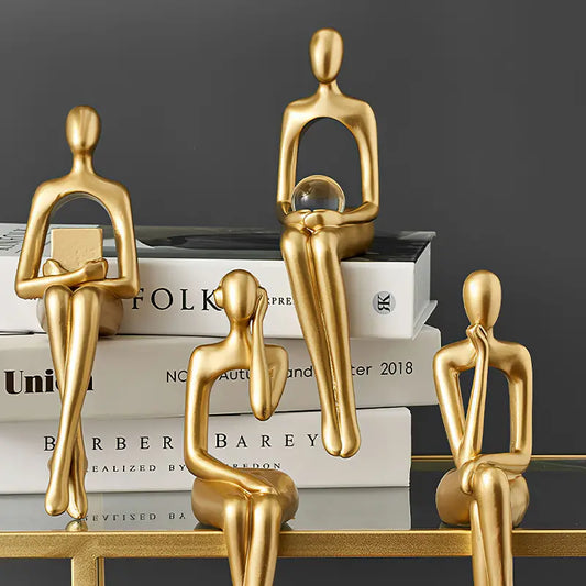 Golden Abstract Sitting Sculpture – Modern Art